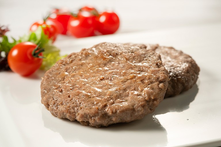 Hamburguesa formada con proteína funcional en la formulación